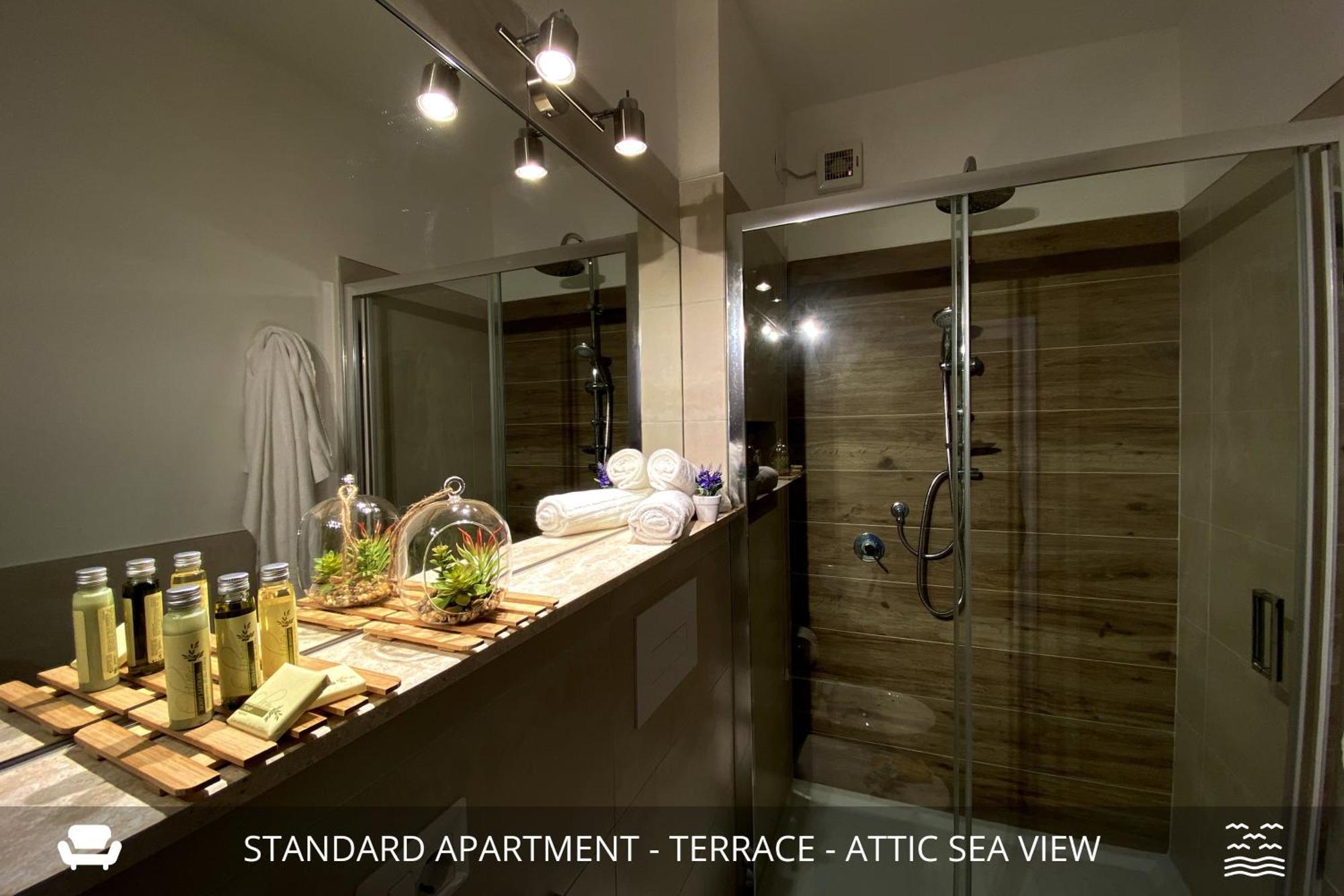 Homey Experience - Design Apartments Golfo Aranci Bagian luar foto